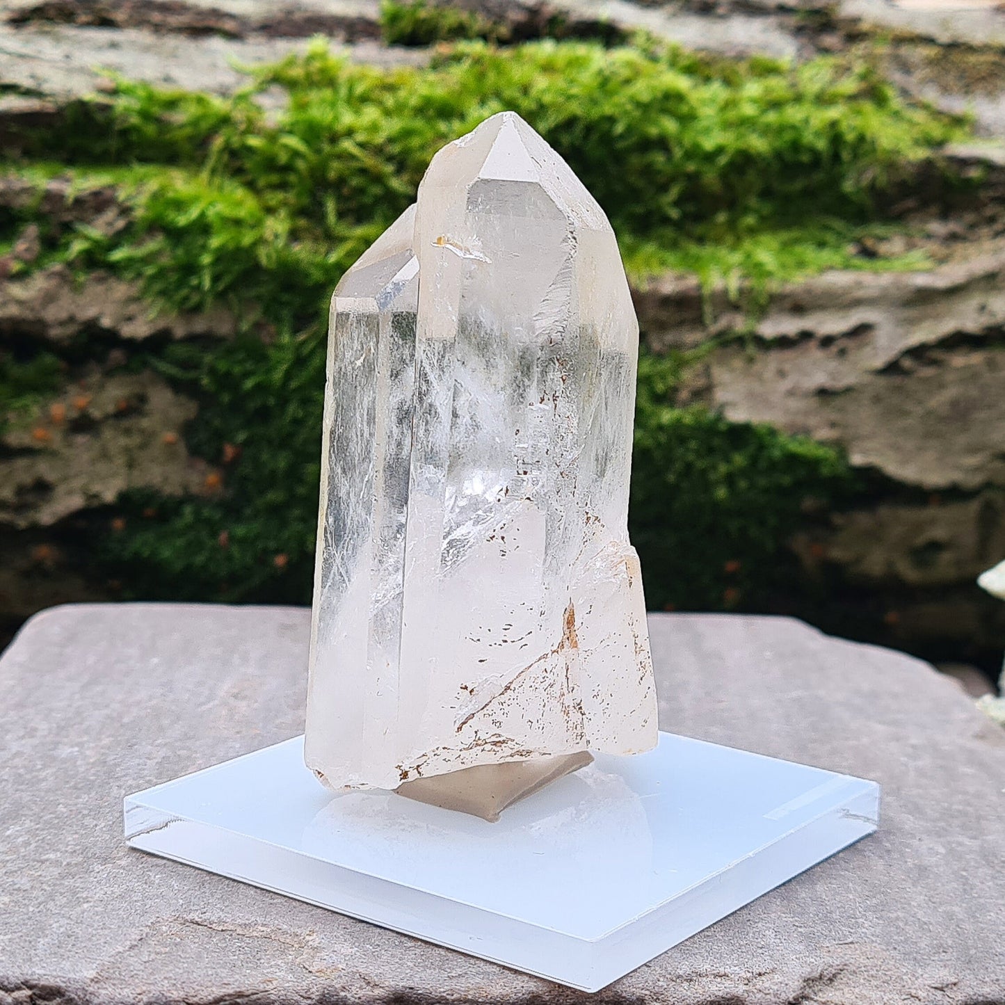 Madagascan Quartz Crystal Cluster with 2 points growing along side each other, I will include a clear acrylic stand and some tac so you can stand it up.