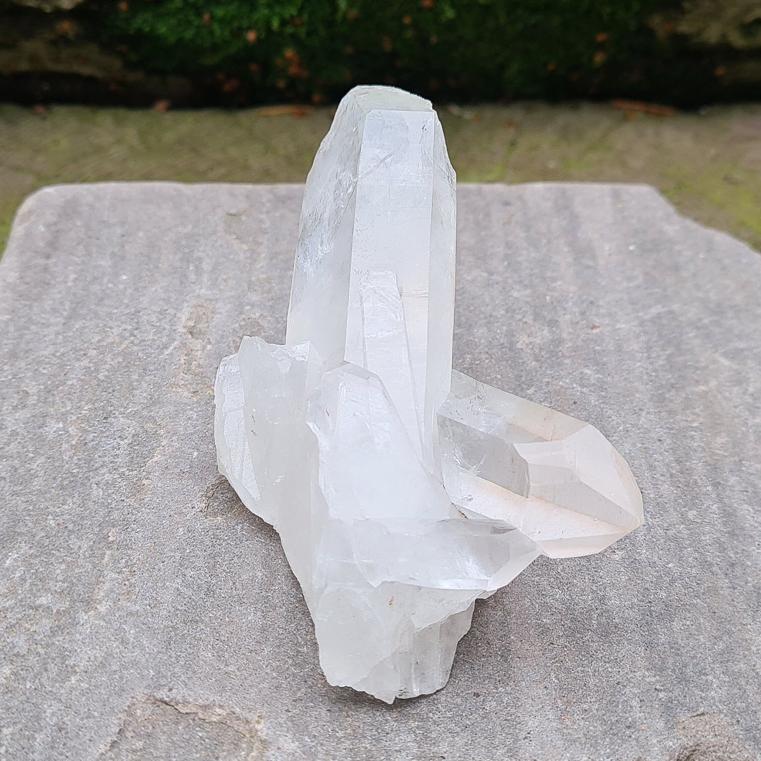 Madagascan Quartz Crystal Cluster with 2 points growing in a cross like formation and a smaller point. This crystal will self stand.