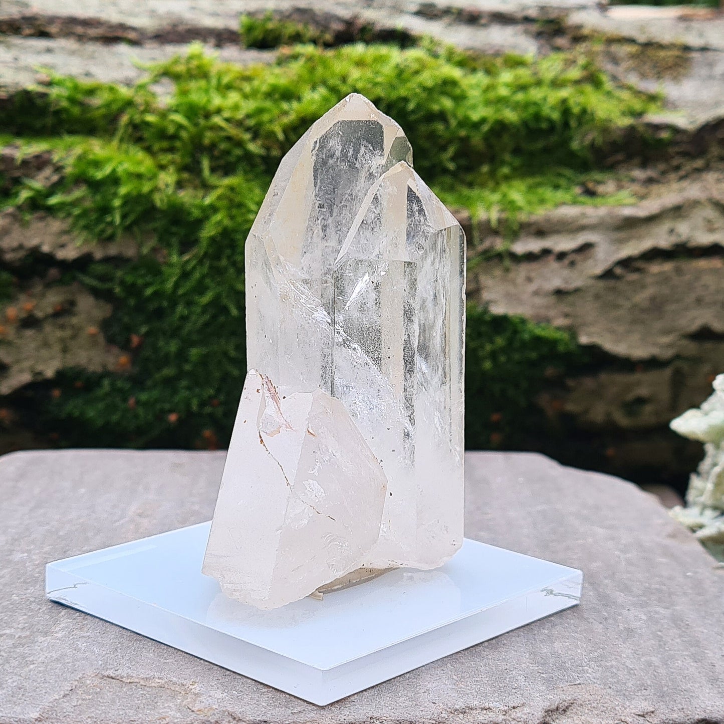 Madagascan Quartz Crystal Cluster with 2 points growing along side each other, I will include a clear acrylic stand and some tac so you can stand it up.