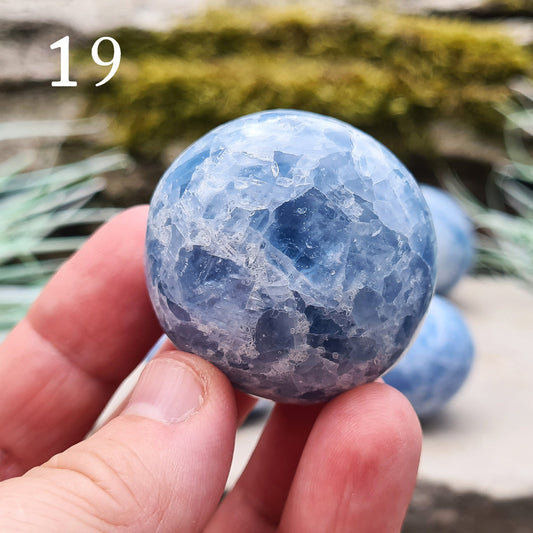 Blue Calcite Crystal, polished from Madagascar. High grade. These are a lovely bright blue colour. Almost spherical. Could be put on a sphere stand. Great size for many uses.