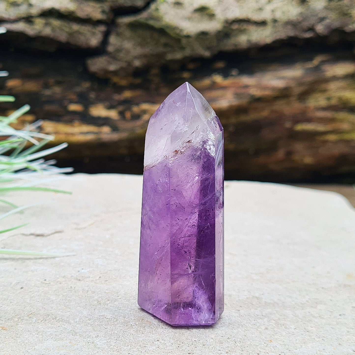 Amethyst Tower from Brazil. This is a great polished crystal with lovely purple colouring and at the top is a very pale lavender/white colouring.