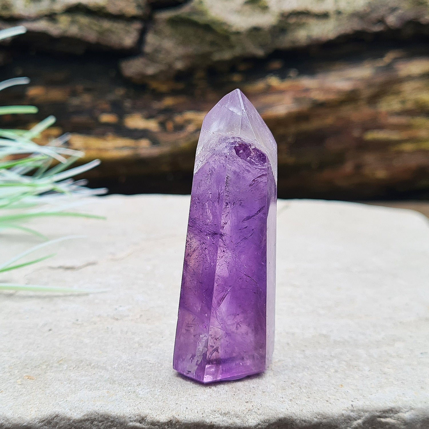 Amethyst Tower from Brazil. This is a great polished crystal with lovely purple colouring and at the top is a very pale lavender/white colouring.