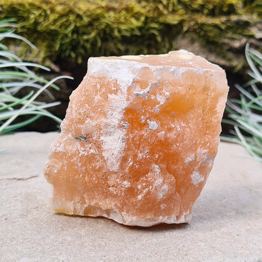 Natural Alabaster Crystal from Utah, USA. Alabaster is a fine-grained variety of gypsum, renowned for its beauty. This particular orange alabaster has developed its distinctive colour from natural mineral inclusions present during the gypsum's crystallization process.