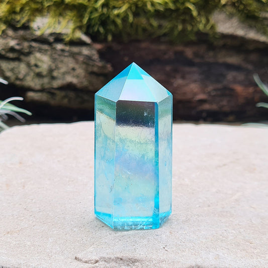 Aqua Aura Quartz Crystal Standing Point from Brazil. Tip is a 6 sided generator point and it has light reflecting inclusions.