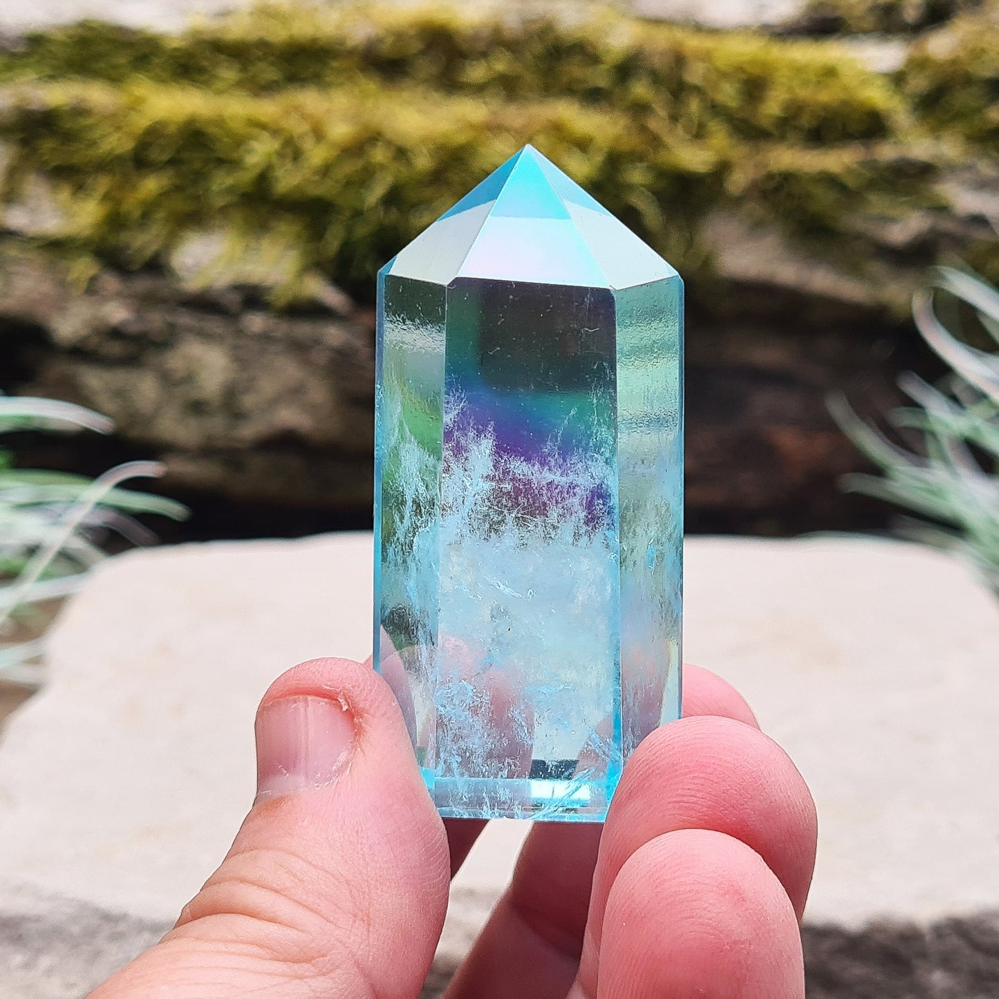 Aqua Aura Quartz Crystal Standing Point from Brazil. Tip is a 6 sided generator point and it has light reflecting inclusions.