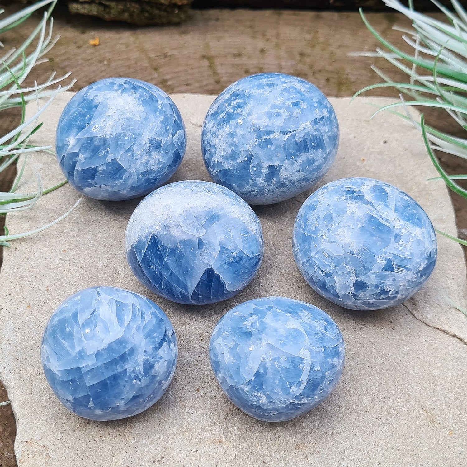 Blue Calcite Crystal, polished from Madagascar. High grade. These are a lovely bright blue colour. Almost spherical. Could be put on a sphere stand. Great size for a multitude of uses.