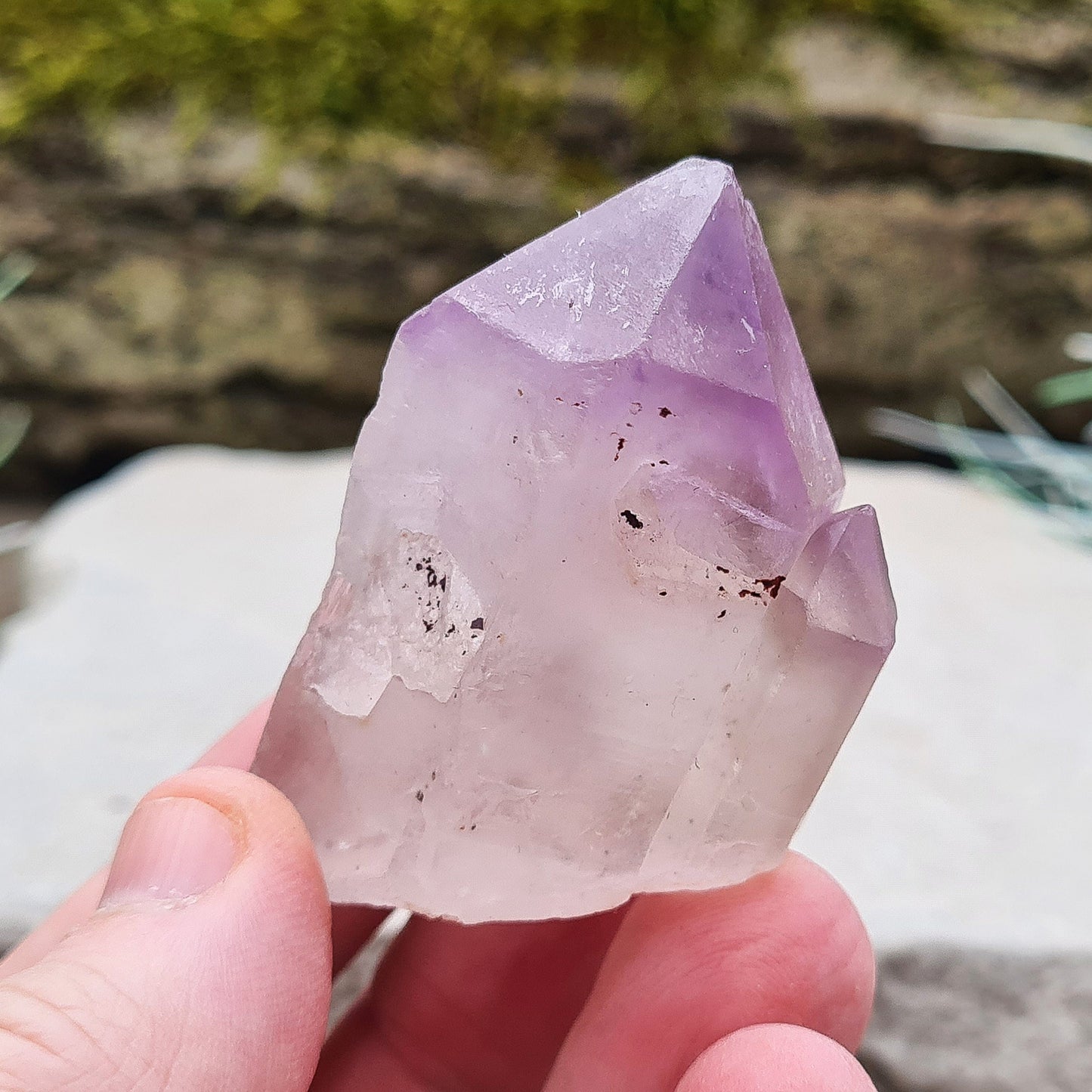 Madagascan Amethyst and Quartz Point. Natural. This point has a companion crystal aside it. Madagascan Amethyst and Quartz have a very different feel and energy to the Quartz and Amethyst that comes out of anywhere else. 