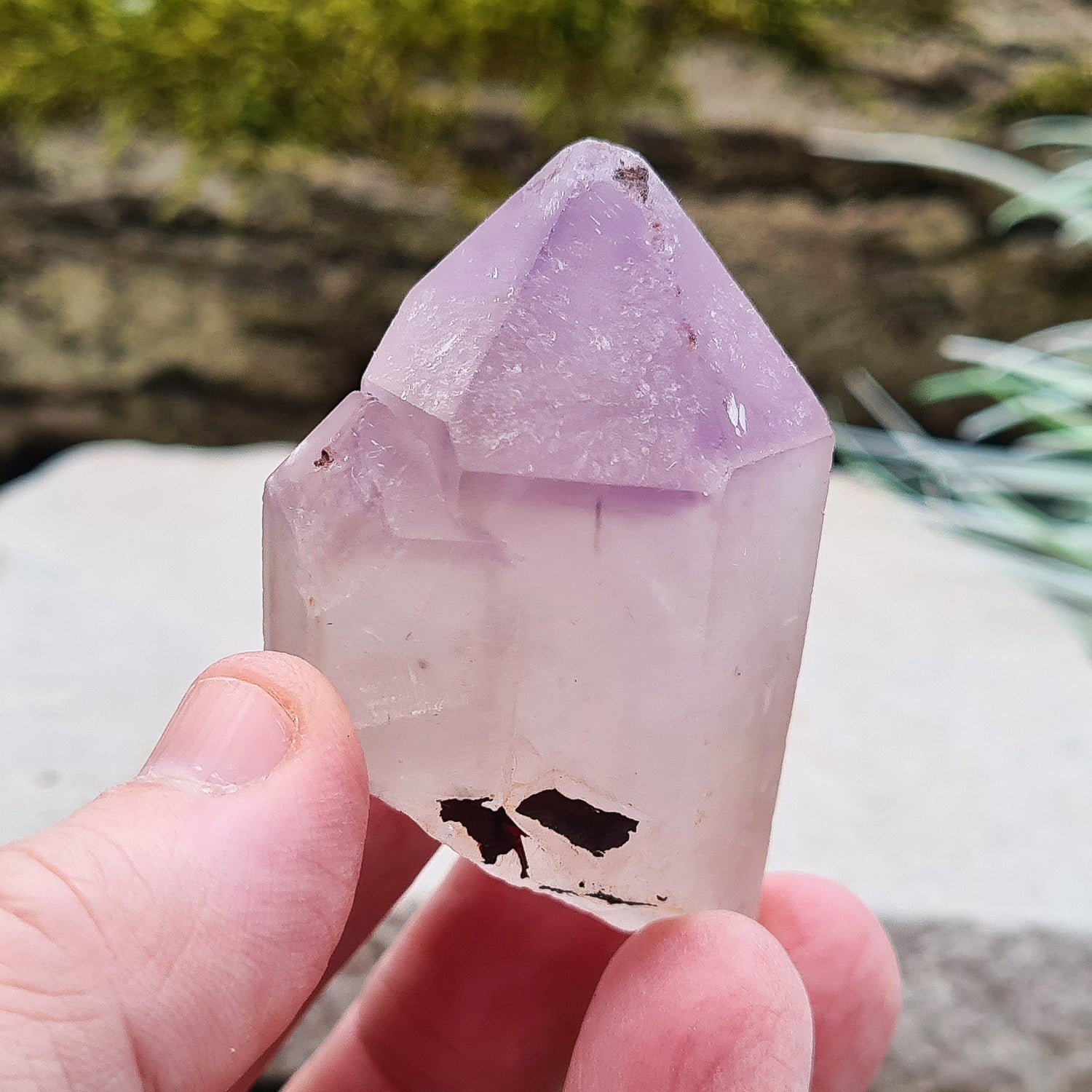 Madagascan Amethyst and Quartz Point. Natural. This point has a companion crystal aside it. Madagascan Amethyst and Quartz have a very different feel and energy to the Quartz and Amethyst that comes out of anywhere else. 