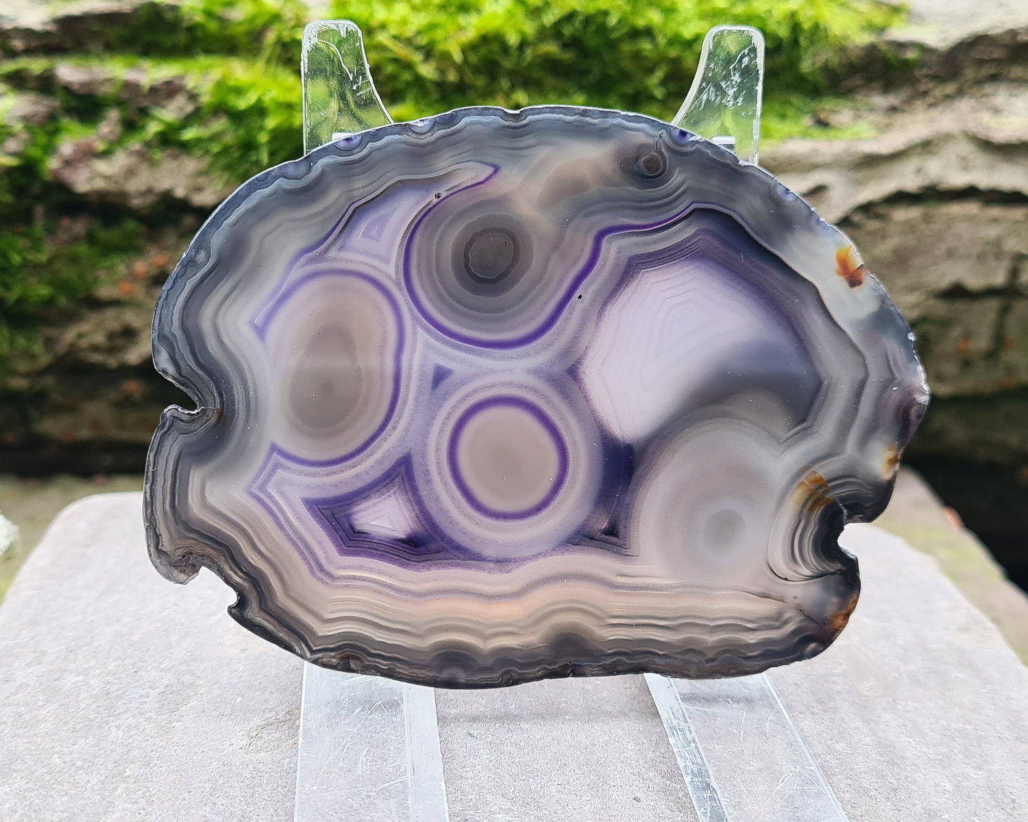 Agate Crystal Slice. This beautiful Agate Slice from Brazil showcases stunning natural patterns and rich color. 