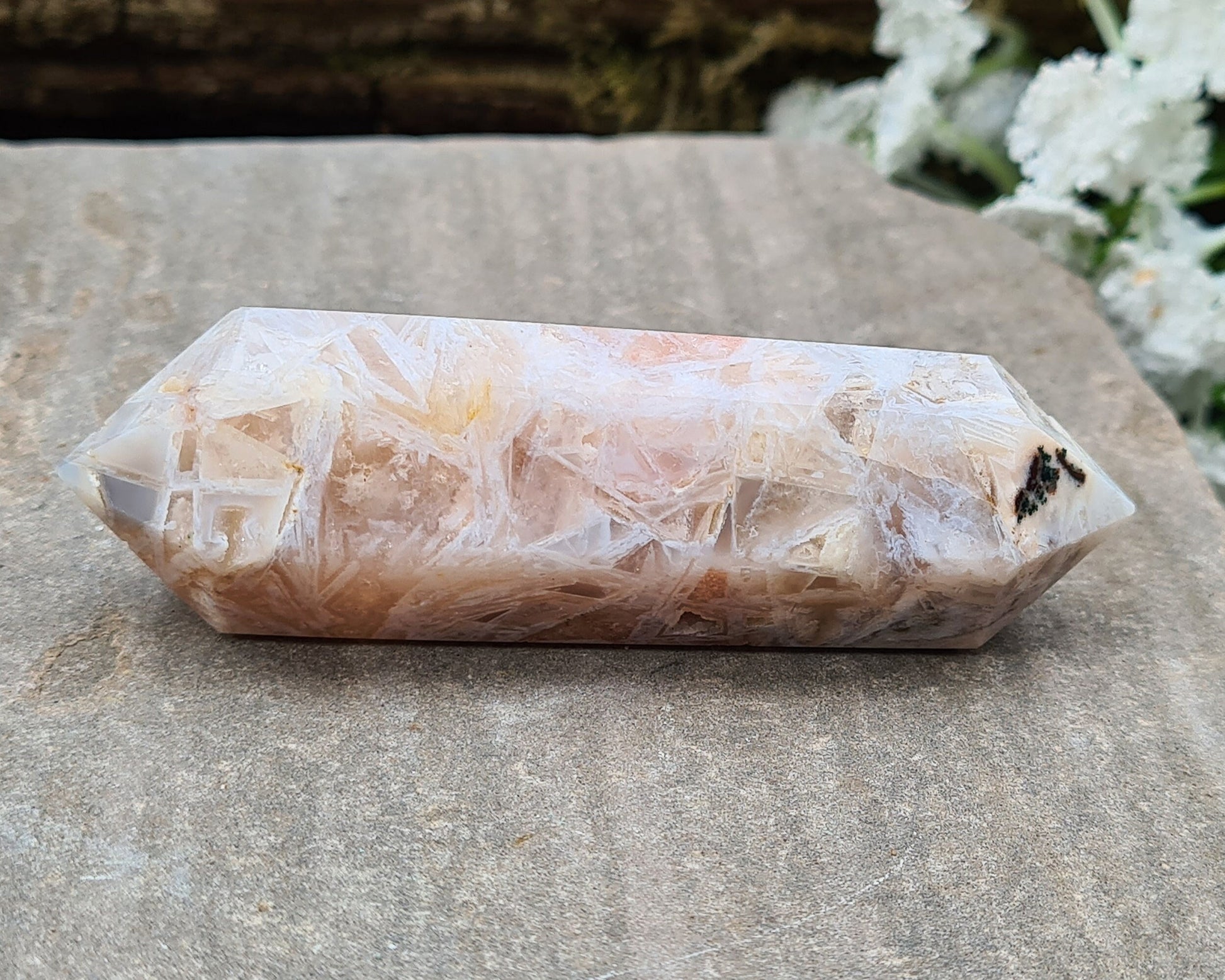 Pink Amethyst Double Terminated Crystal Wand
This beautiful double terminated wand from Brazil features soft pink and white colouring with delicate patterns. With generator points on both ends, it can both send and receive energy, helping to bring balance and flow.