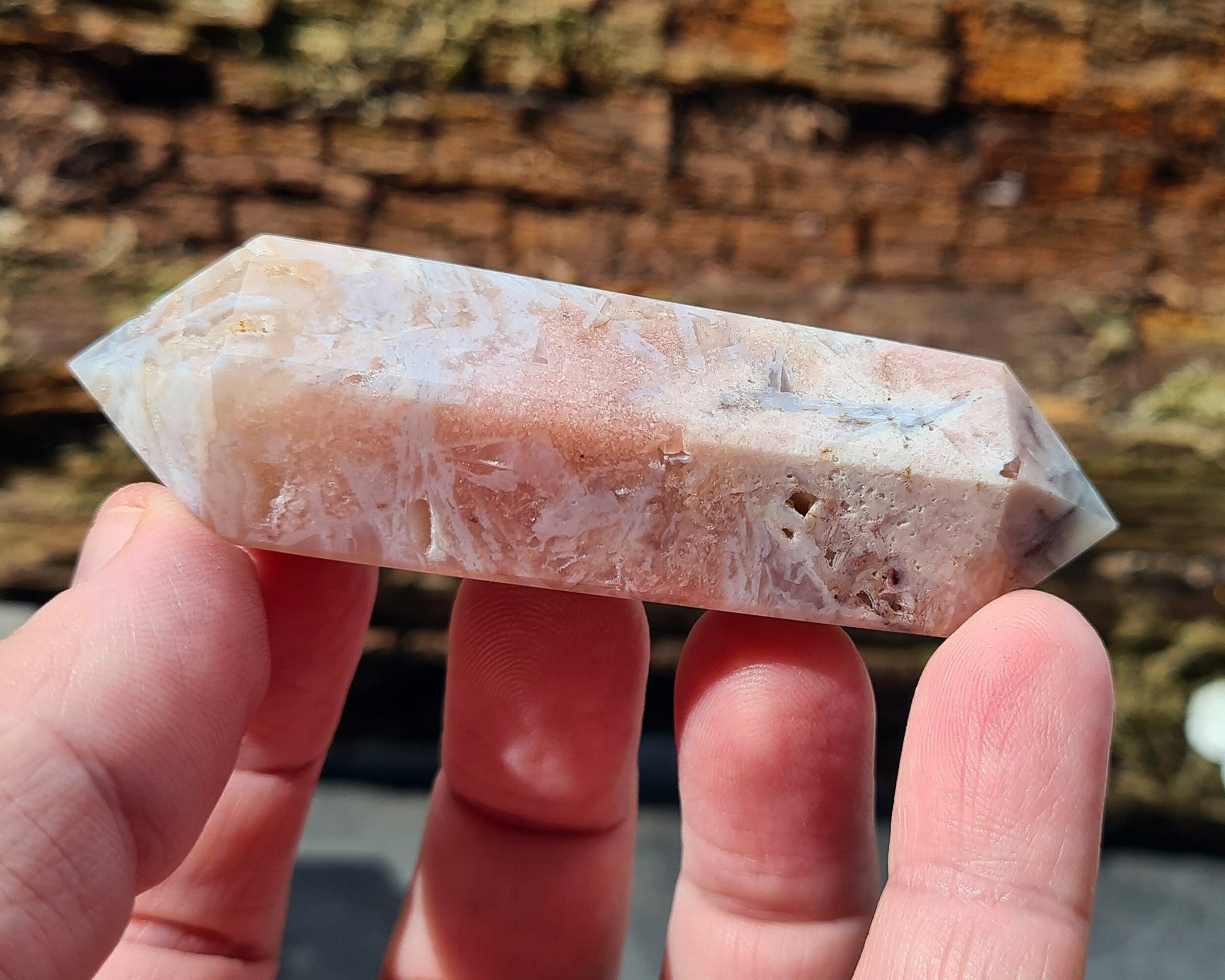 Pink Amethyst Double Terminated Crystal Wand
This beautiful double terminated wand from Brazil features soft pink and white colouring with delicate patterns. With generator points on both ends, it can both send and receive energy, helping to bring balance and flow.