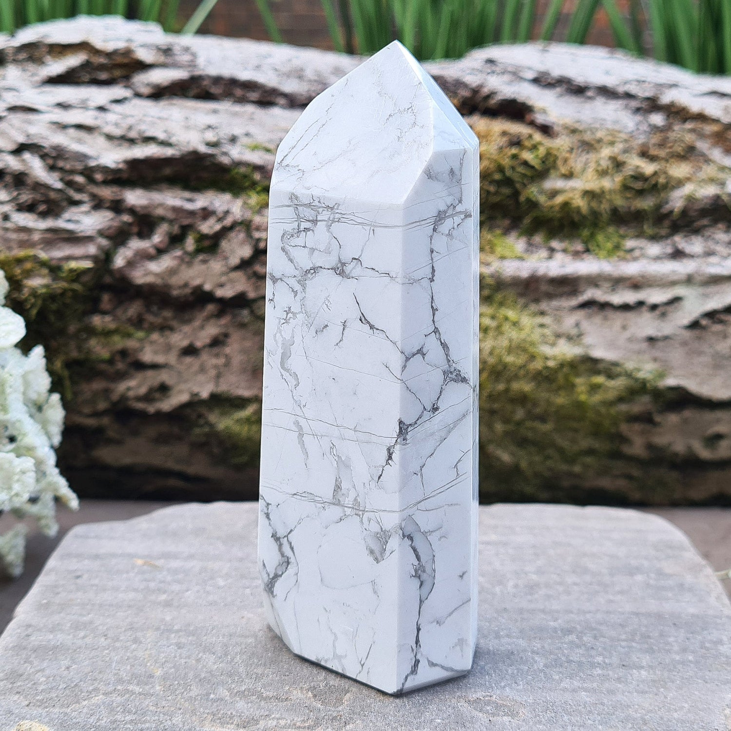 Howlite Crystal Point. Off white with grey marble like patterning, nicely polished. My supplier has an exclusivity arrangement with the mine that produces this stone so they get the best quality.