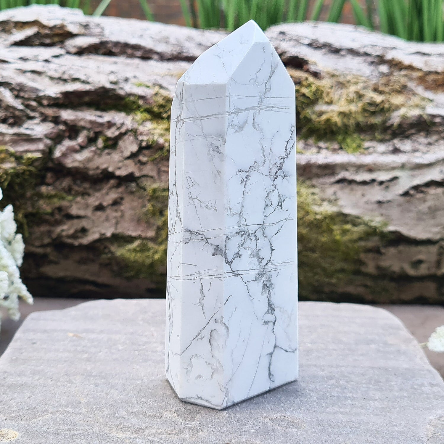 Howlite Crystal Point. Off white with grey marble like patterning, nicely polished. My supplier has an exclusivity arrangement with the mine that produces this stone so they get the best quality.