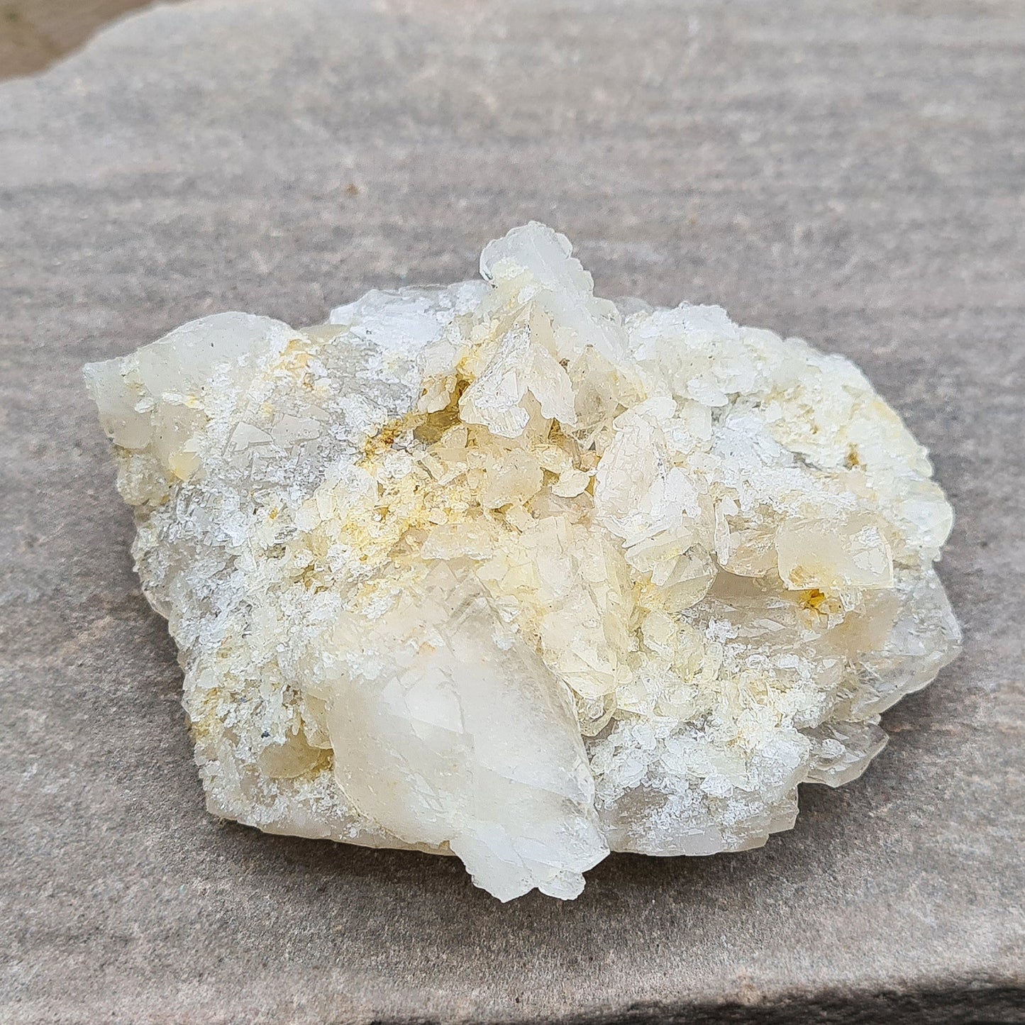 Elestial Quartz Crystal&nbsp;with a sugar coating of small sparking quartz crystals on the top and when you turn it over you can see the shiny elestial formations. 