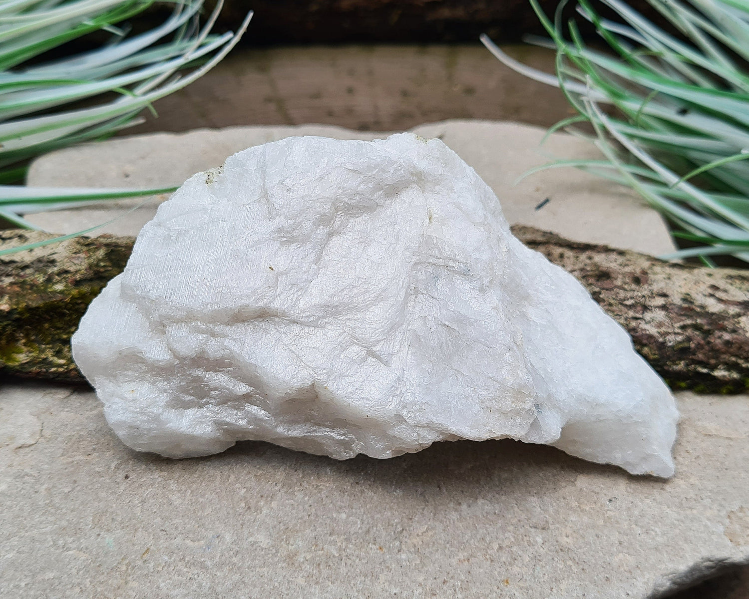 Natural Moonstone (white) crystal. from India. lovely opalescence when light is on the crystal.