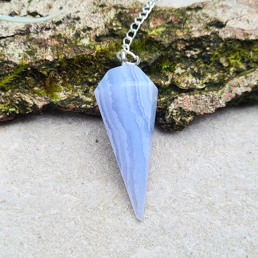 Blue Lace Agate Crystal Pendulum, lovely blue colouring as you would expect from Blue Lace. From South Africa. Pendulum has a chain and ring on the end. 