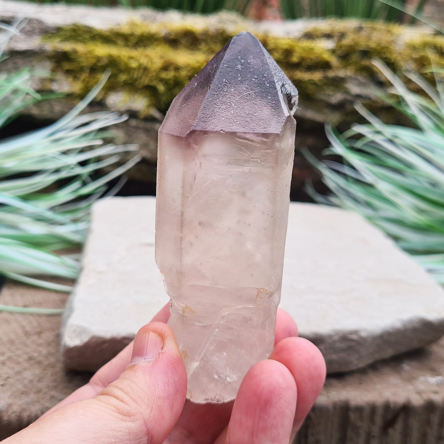 Madagascan Amethyst and Quartz Point. Natural. Madagascan Smoky Amethyst and Quartz have a very different feel and energy to the Quartz and Amethyst that comes out of anywhere else.