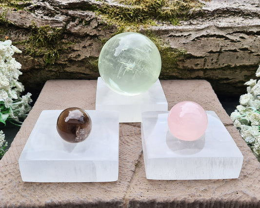 Selenite Crystal Ball or Crystal Sphere Stand. These Selenite Crystal Sphere Stands make sure your crystal balls are charged and energised for when you need them and a great way to display them.