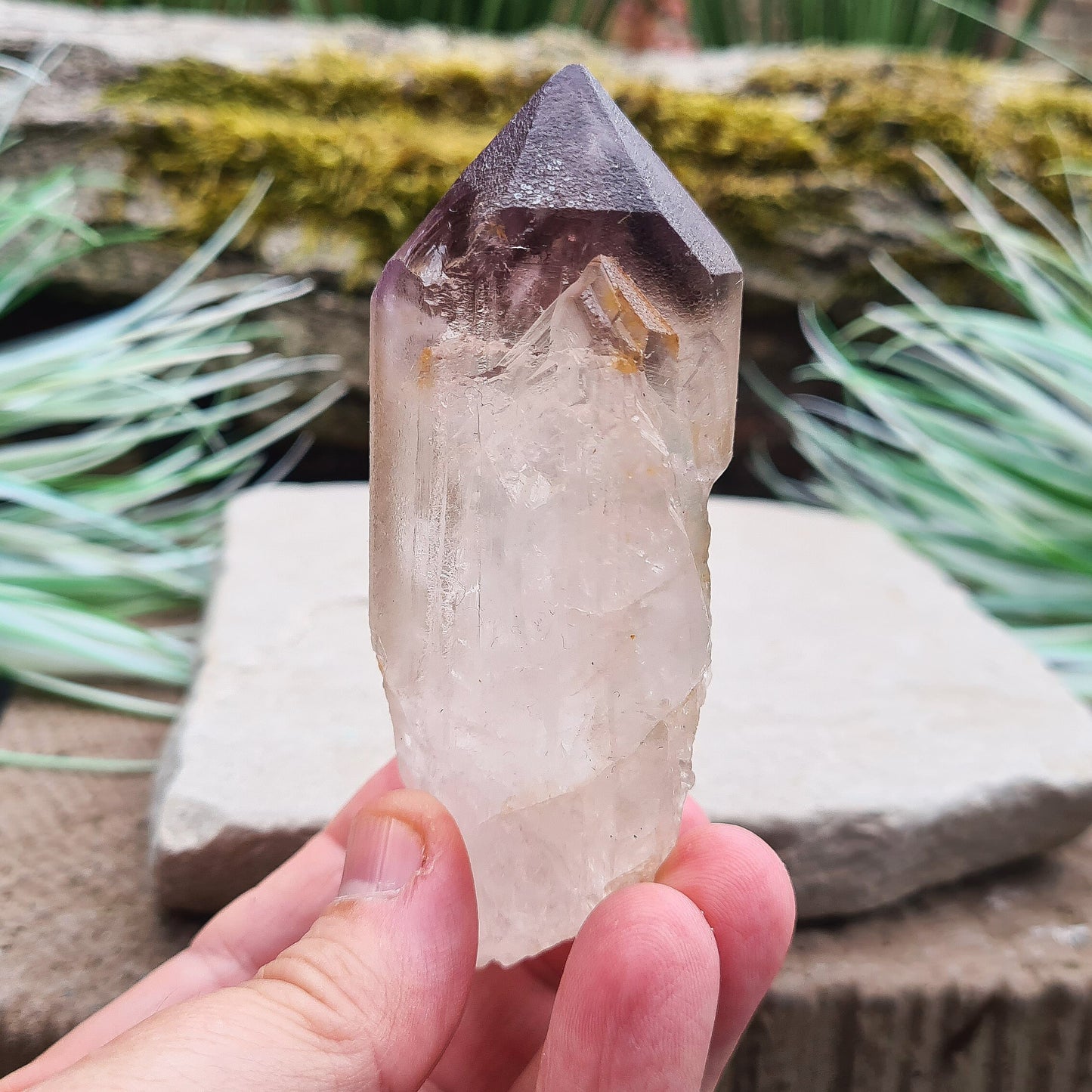 Madagascan Amethyst and Quartz Point. Natural. Madagascan Smoky Amethyst and Quartz have a very different feel and energy to the Quartz and Amethyst that comes out of anywhere else.