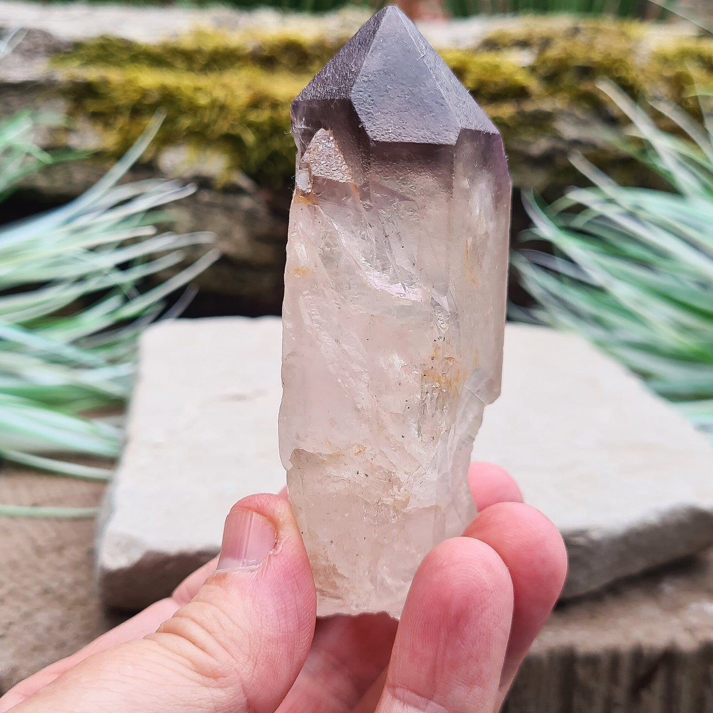 Madagascan Amethyst and Quartz Point. Natural. Madagascan Smoky Amethyst and Quartz have a very different feel and energy to the Quartz and Amethyst that comes out of anywhere else.