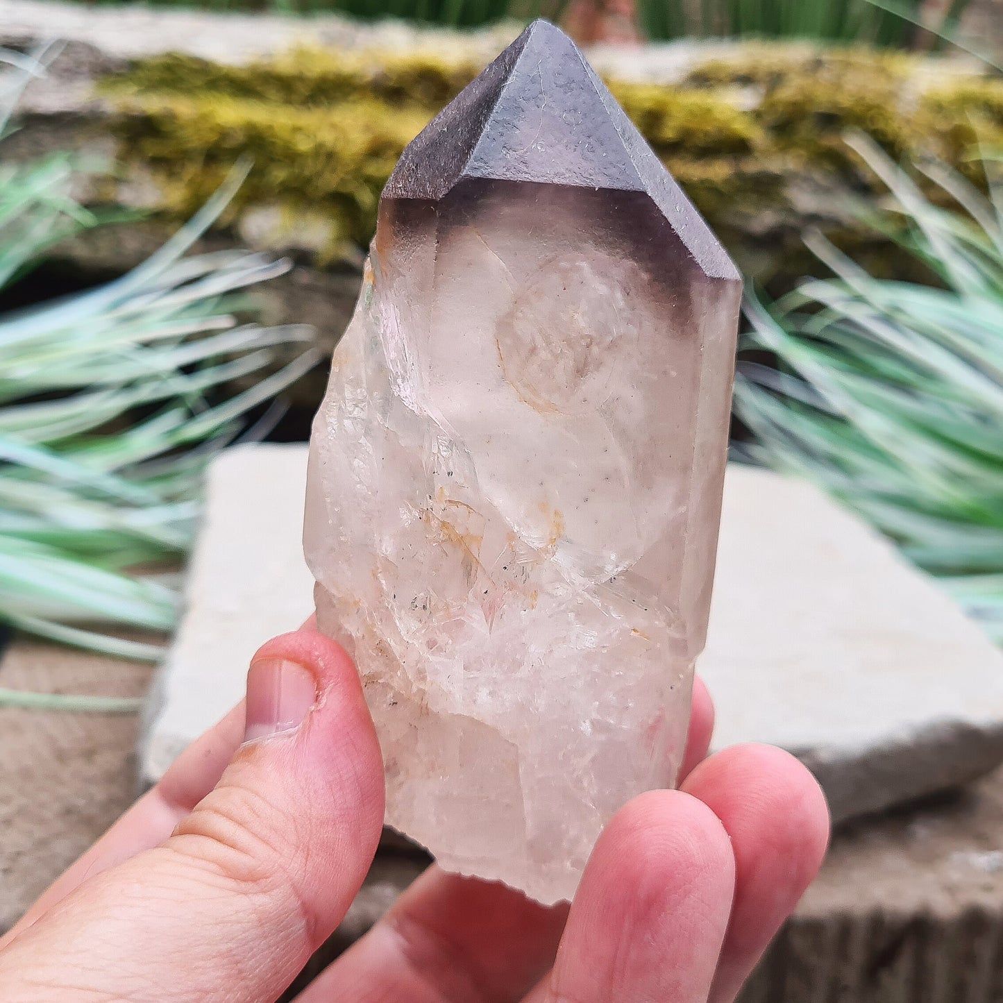 Madagascan Amethyst and Quartz Point. Natural. Madagascan Smoky Amethyst and Quartz have a very different feel and energy to the Quartz and Amethyst that comes out of anywhere else.