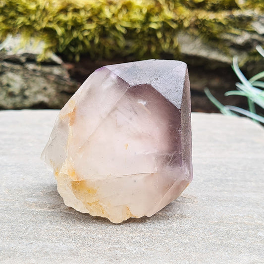 Madagascan Amethyst and Quartz Point. Natural. Madagascan Amethyst and Quartz have a very different feel and energy to the Quartz and Amethyst that comes out of anywhere else.