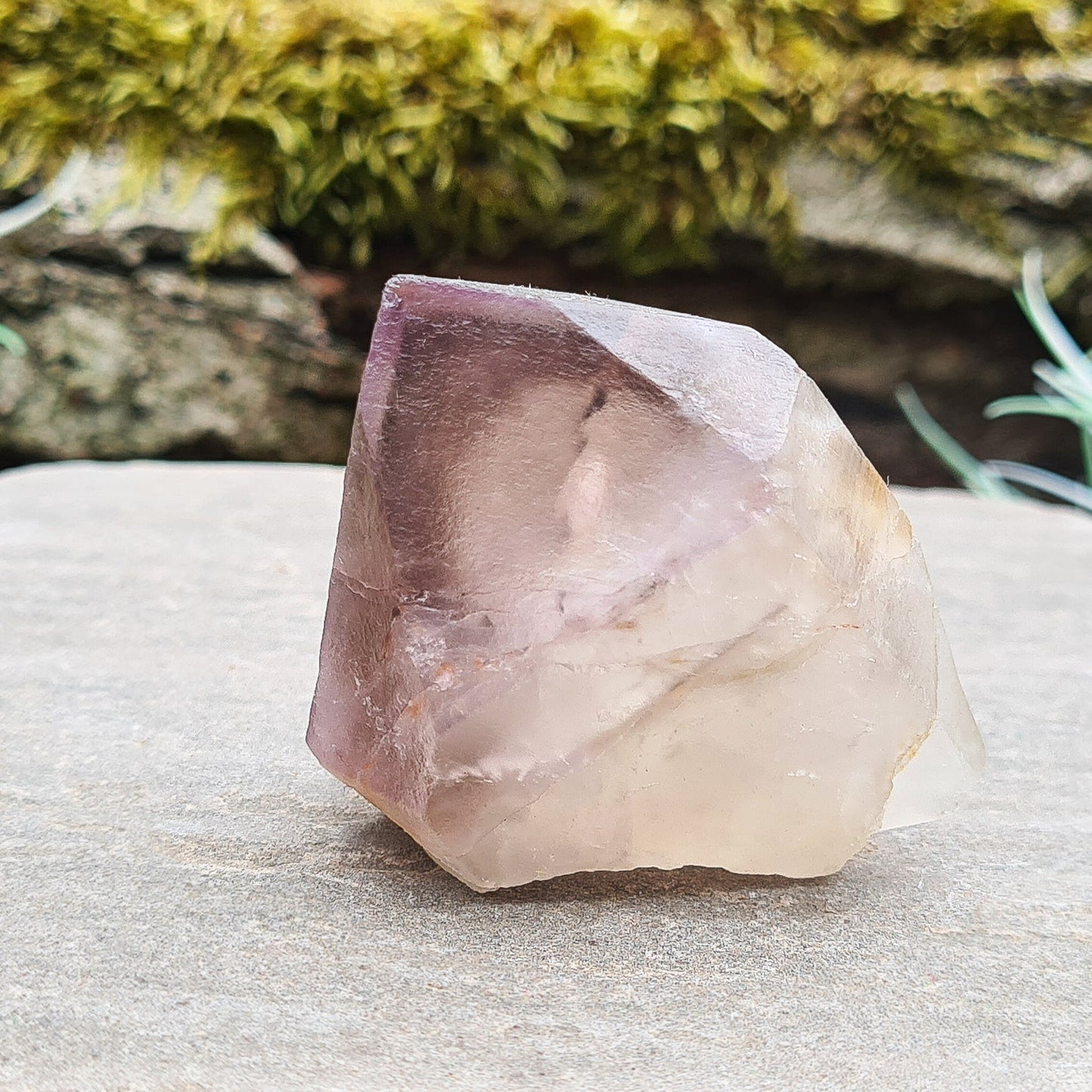 Madagascar Quartz with Amethyst Tip: Clear your aura, balance chakras, enhance intuition, and promote emotional well-being with this unique crystal.