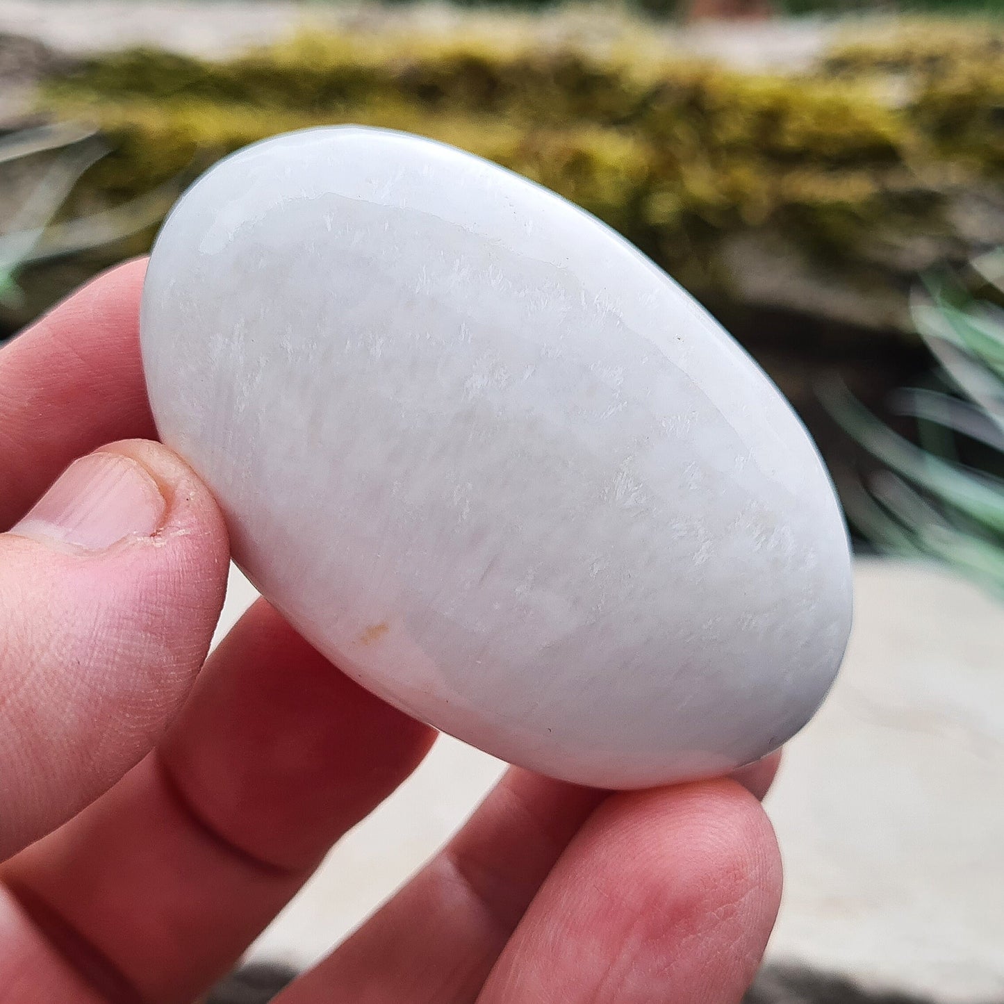 Scolecite Crystal Palm Stone. Scolecite is a high vibrational stone with a soft and gentle energy.