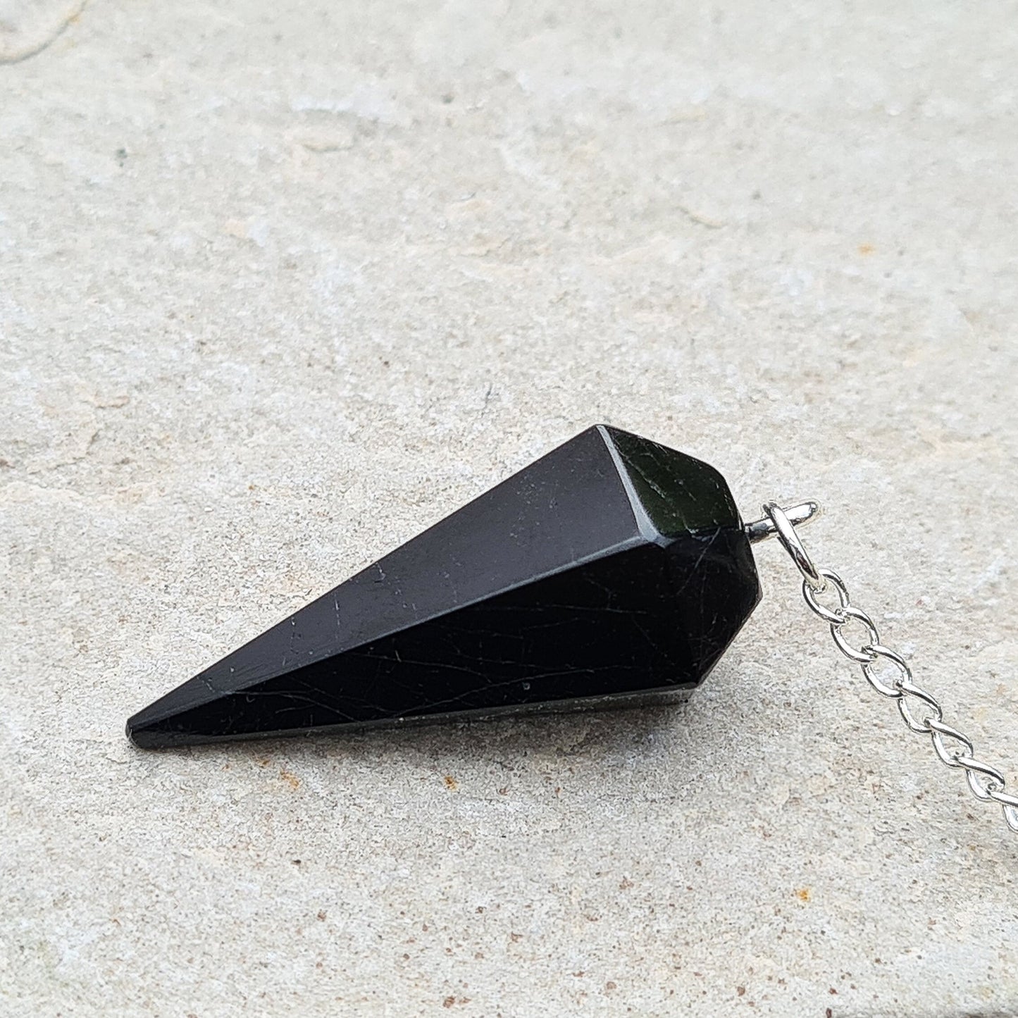 Black Tourmaline Crystal Pendulum. Will come in a box or pouch to keep it in.