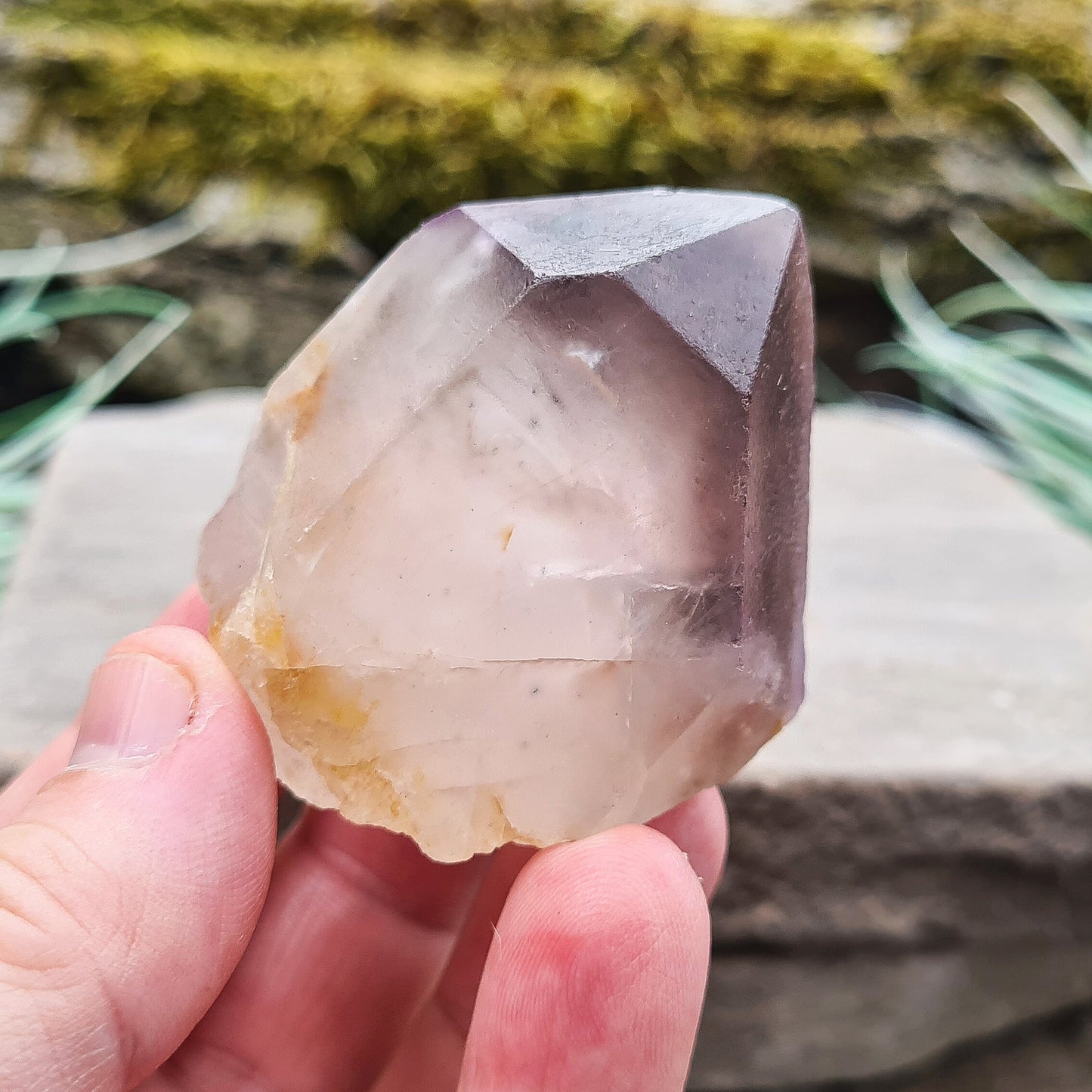 Madagascar Quartz with Amethyst Tip: Clear your aura, balance chakras, enhance intuition, and promote emotional well-being with this unique crystal.