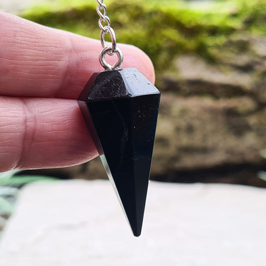 Black Tourmaline Crystal Pendulum. Will come in a box or pouch to keep it in.