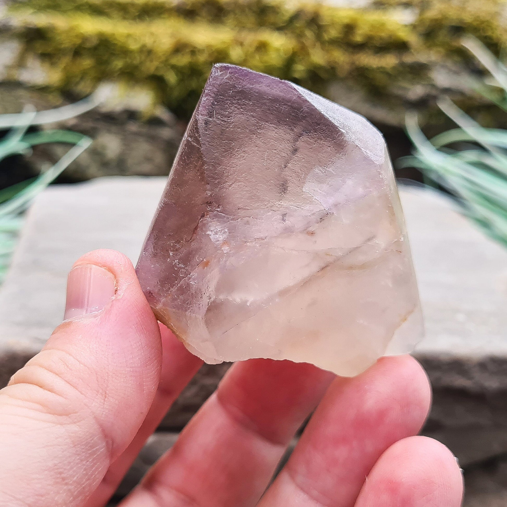 Madagascar Quartz with Amethyst Tip: Clear your aura, balance chakras, enhance intuition, and promote emotional well-being with this unique crystal.