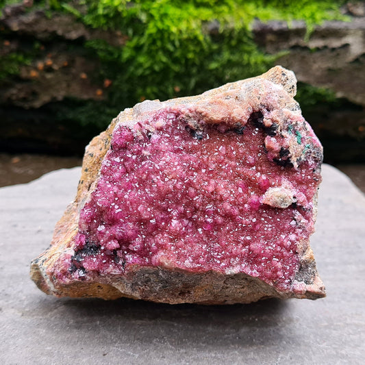 Cobalto Calcite Cluster from Morocco. The crystalline form of Pink Calcite. Also known as Cobaltoan Calcite, Colbaltian Calcite, Erythrite, Cobalt Bloom, Salrose, and Aphrodite Stone. Lovely bright fuschia pink colouring and the crystals create a glitter bomb in the light.