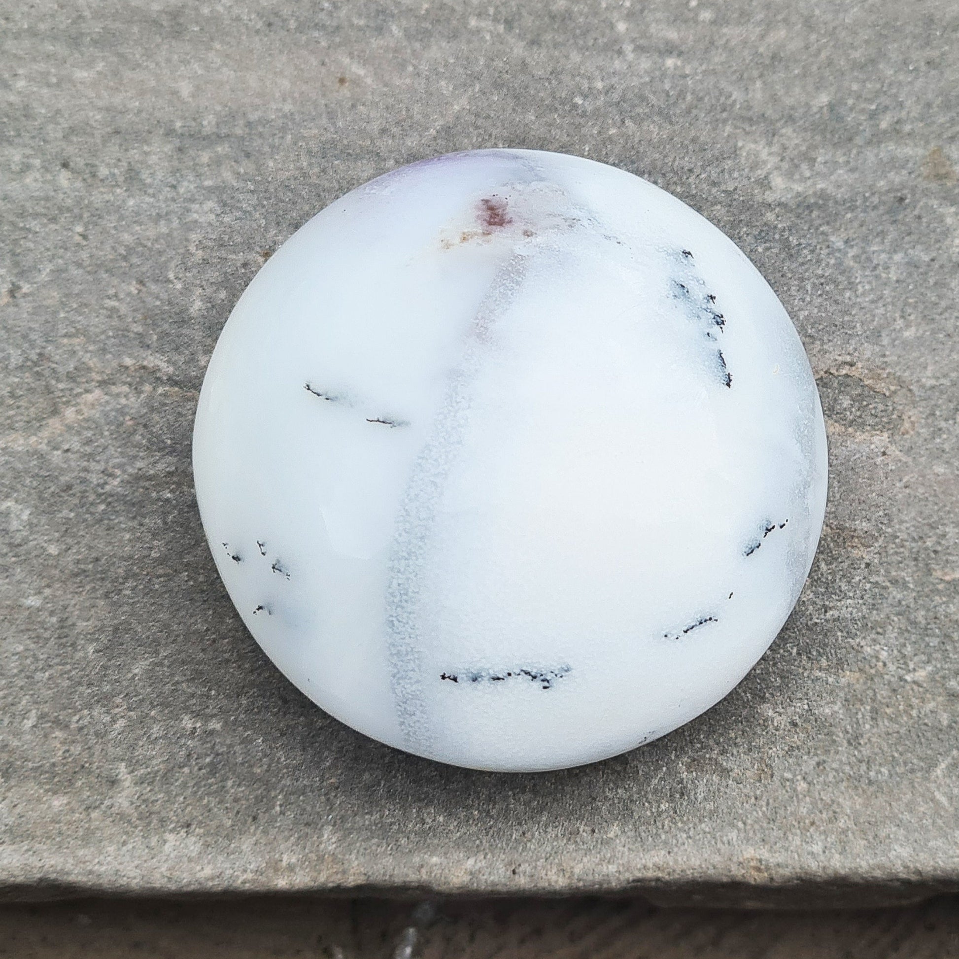 Merlinite Crystal from Madagascar. Fabulous, off white, grey and Lavender colouring. Merlinite Crystals are made up of White Opal and dendritic (fern like) inclusions
