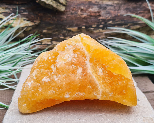 Natural Orange Calcite Crystal from Mexico. Lovely bright orange colour. This piece can be positioned upright.