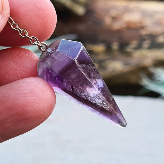 Dark Amethyst Crystal Pendulum. Lovely dark purple colour and when held in the light you can see the smoky phantom inside. 