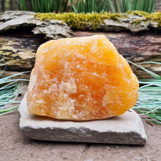 Natural Orange Calcite Crystal from Mexico. Lovely bright orange colour. This piece can be positioned upright.