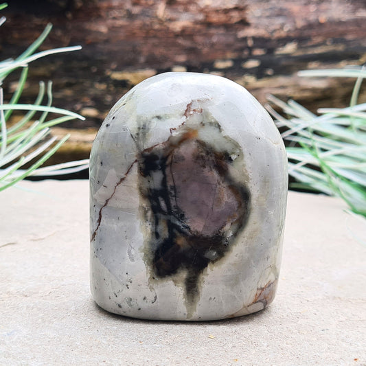 Picasso Jasper is a crystals whose patterning resembles abstract art. It is known for its grounding energy, promoting creativity, transformation, and emotional healing.