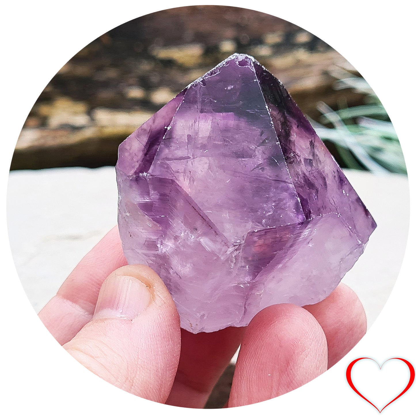 Amethyst crystal standing point with cut base from Brazil. This is a great crystal with dark purple colouring. Point is polished, the rest is left natural.