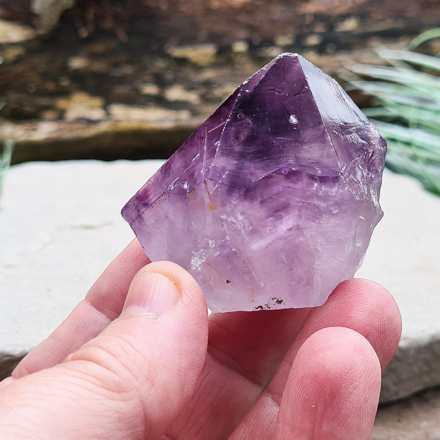 Amethyst crystal standing point with cut base from Brazil. This is a great crystal with dark purple colouring. Point is polished, the rest is left natural.