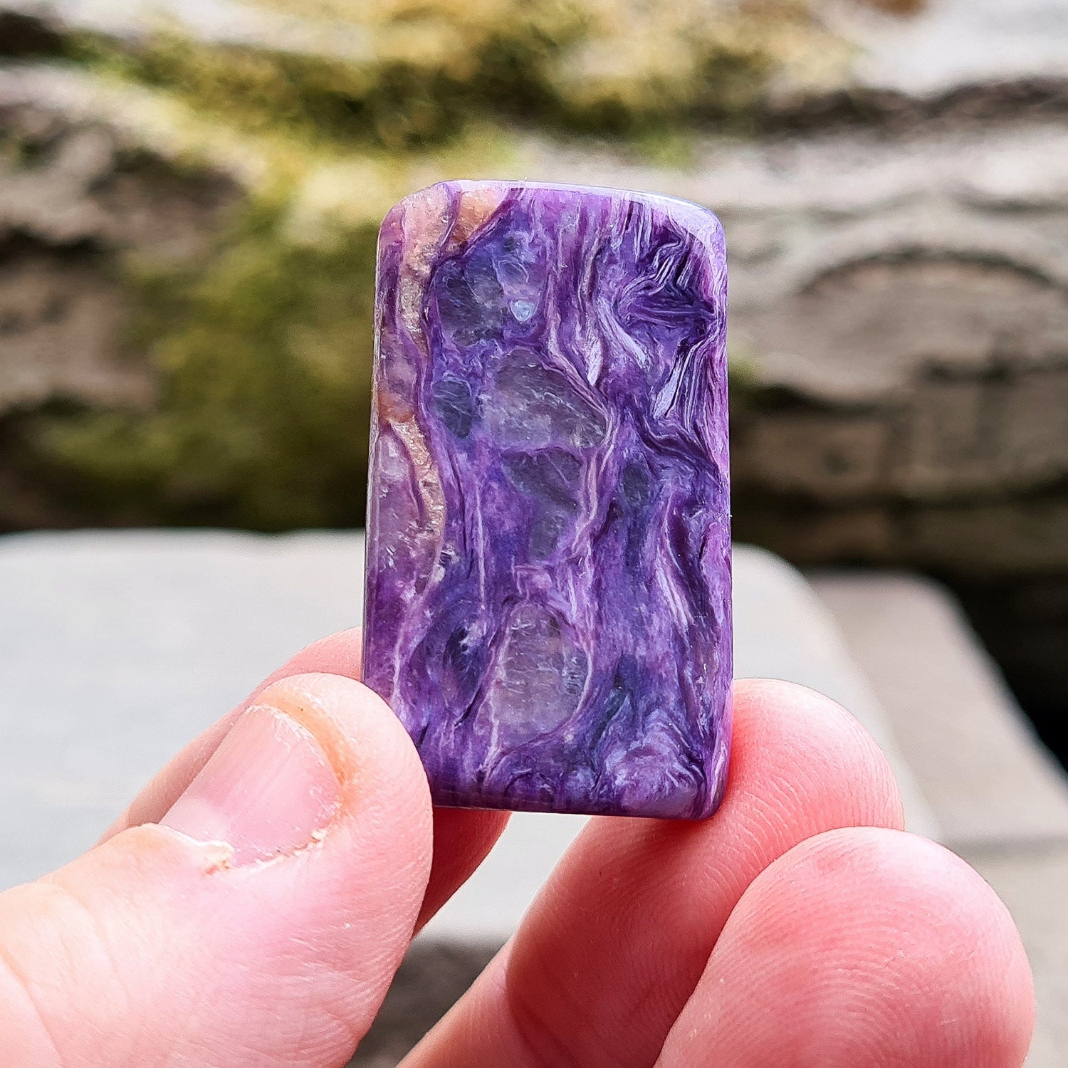 Charoite Crystal, polished slice from Russia. Beautiful patterning and fabulous purple colouring. These slices are just so handy for keeping on you, putting on the body, including them in a crystal grid and so much more.