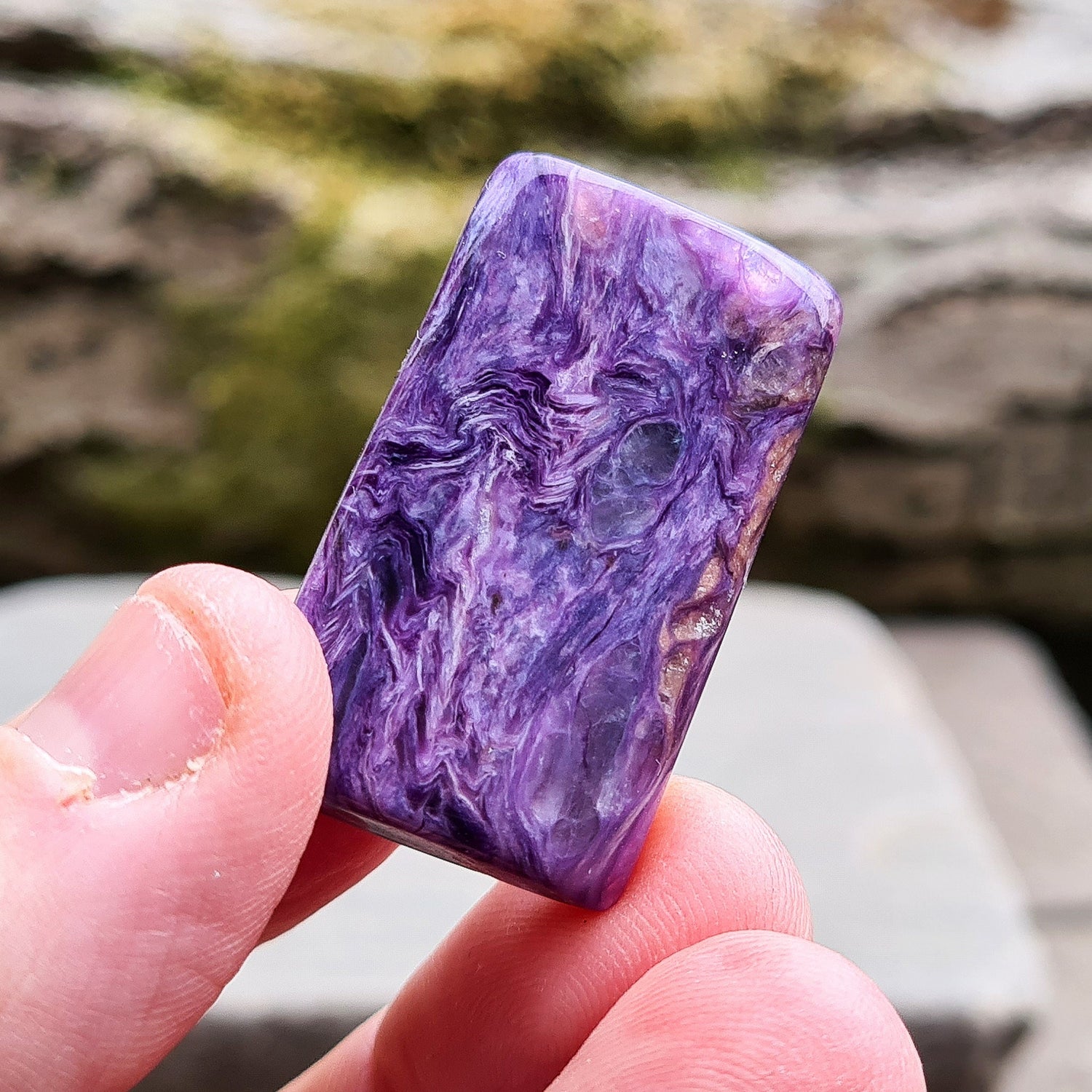 Charoite Crystal, polished slice from Russia. Beautiful patterning and fabulous purple colouring. These slices are just so handy for keeping on you, putting on the body, including them in a crystal grid and so much more.