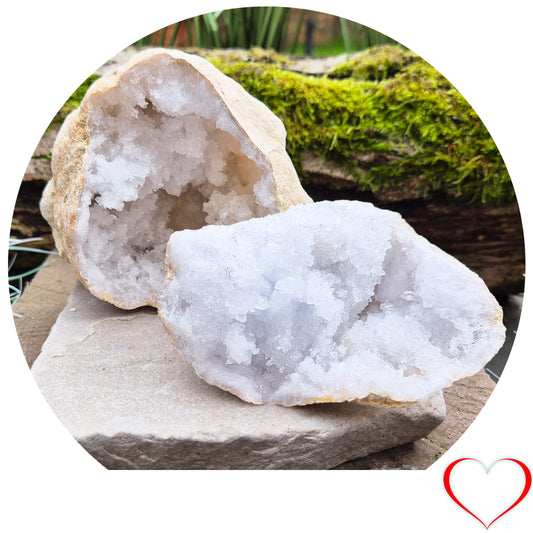 White Quartz Crystal Geode Pair, from Morocco. Lovely sparkling white quartz crystal formations in both sections of the geode. Each one can sit on a flat surface on its own.