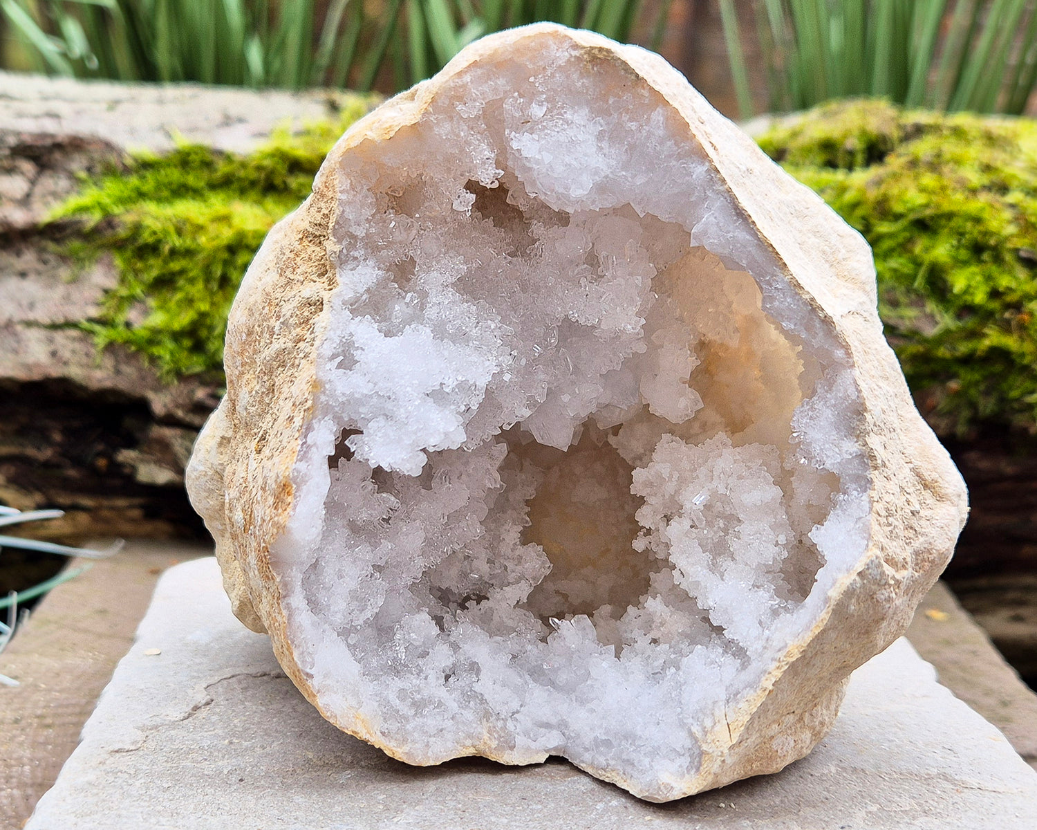 White Quartz Crystal Geode Pair, from Morocco. Lovely sparkling white quartz crystal formations in both sections of the geode. Each one can sit on a flat surface on its own.