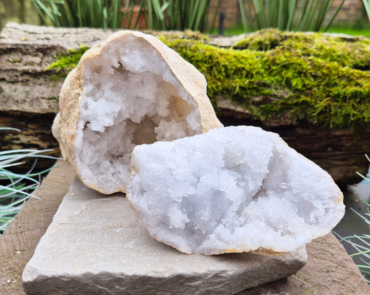 White Quartz Crystal Geode Pair, from Morocco. Lovely sparkling white quartz crystal formations in both sections of the geode. 