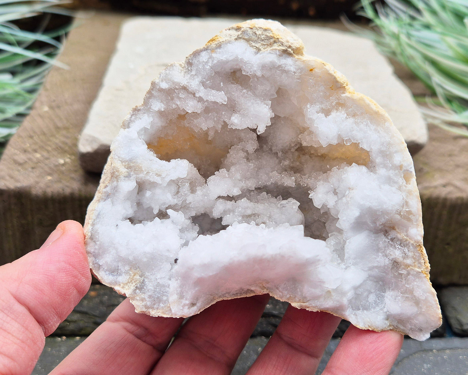 White Quartz Crystal Geode Pair, from Morocco. Lovely sparkling white quartz crystal formations in both sections of the geode. Each can sit on a flat surface on its own.