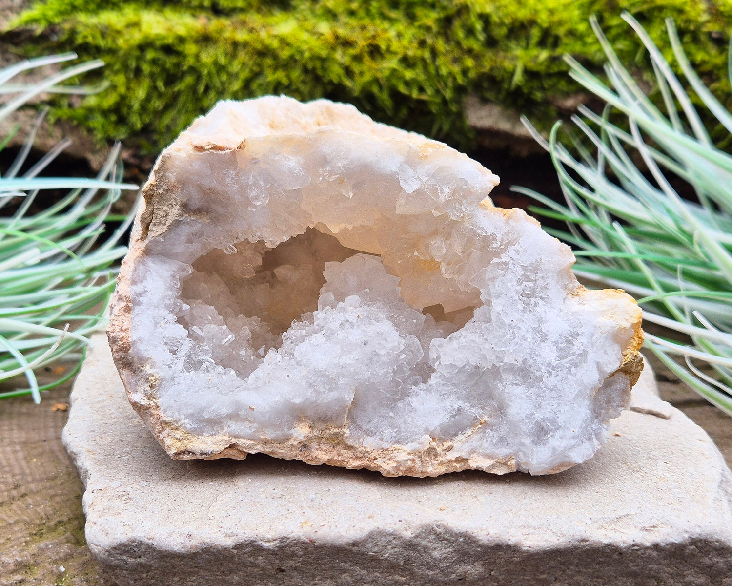 White Quartz Crystal Geode Pair, from Morocco. Lovely sparkling white quartz crystal formations in both sections of the geode. I will include a clear acrylic stand for one of the section to sit on.