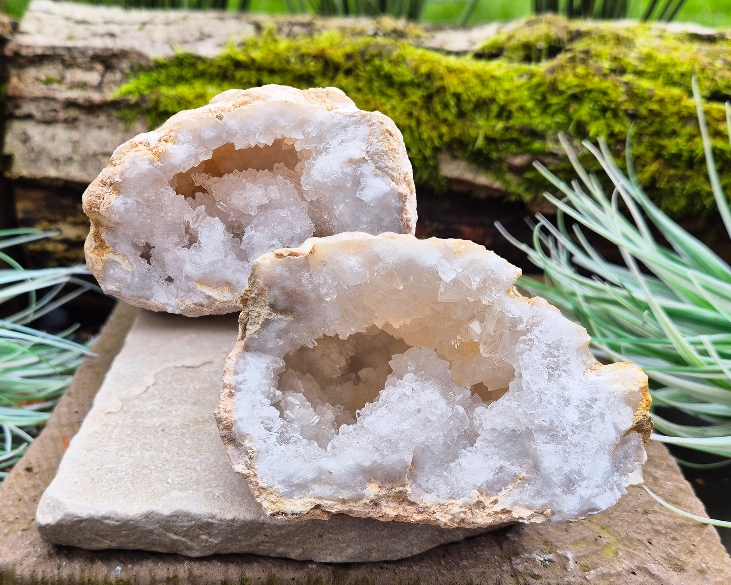 White Quartz Crystal Geode Pair, from Morocco. Lovely sparkling white quartz crystal formations in both sections of the geode. I will include a clear acrylic stand for one of the section to sit on.