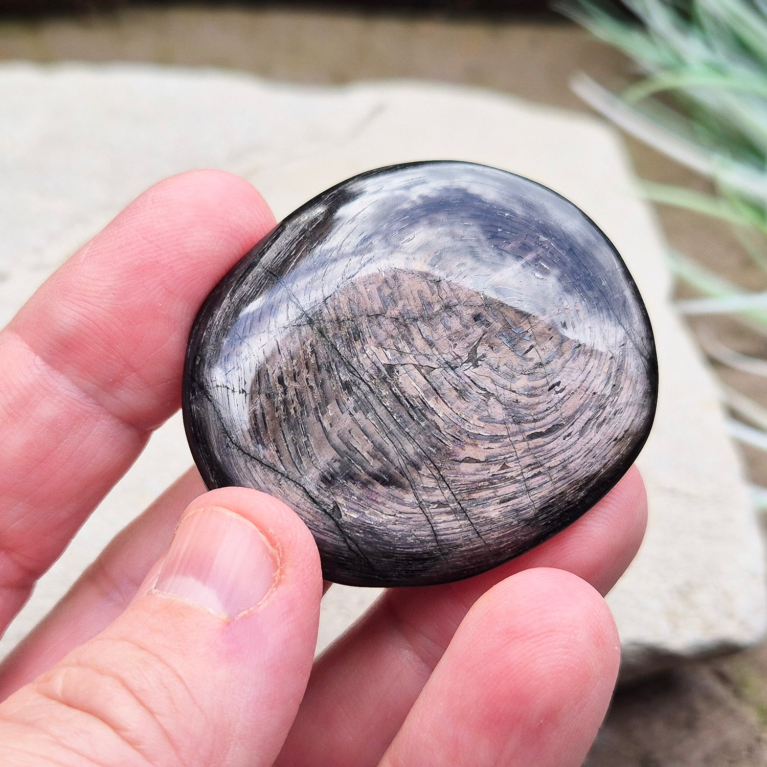 Violet Hypersthene is a rare and beautiful variation of the Hypersthene mineral. Known for its deep, velvety violet hues that shimmer in the light. This stone originates from Quebec's Labrador Trough, also known as the New Quebec Orogen, Canada.