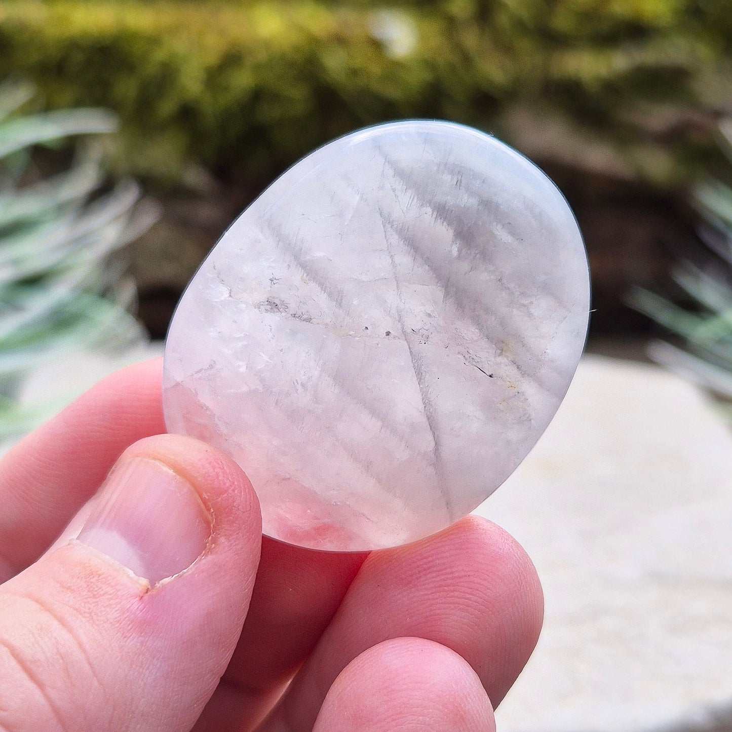 Lunar Rose Quartz Crystal or Lunar Quartz Crystal Palm Stone is from one source in Namibia. Luna Quartz (or Lunar Rose Quartz) is a unique combination of Rose Quartz and Graphite